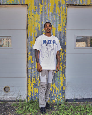 N.D.A. Tee