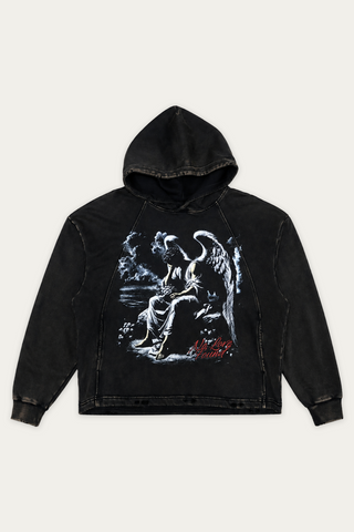 A washed black cropped hoodie featuring a large graphic print of a winged figure on the front, with red and white text reading 'L.A.