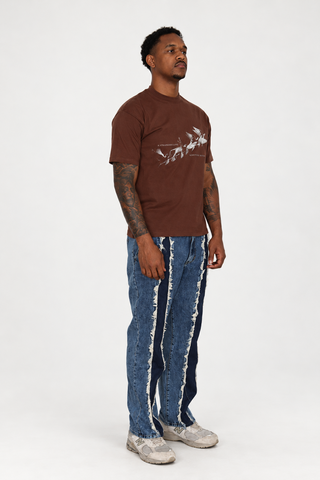 Somewhere Better T-Shirt in walnut brown with cream bird graphic, full-body right-facing three-quarter studio view.